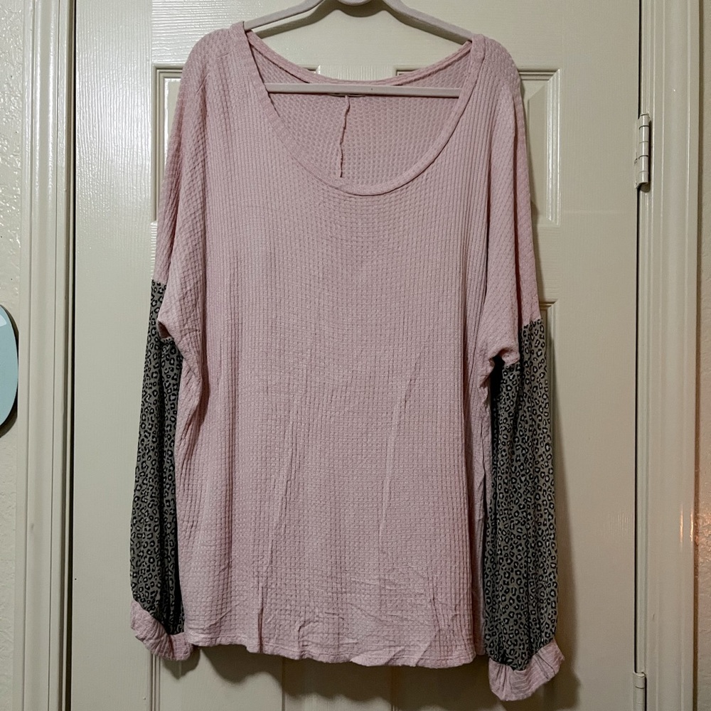 Light pink sweater with cheetah print sleeves